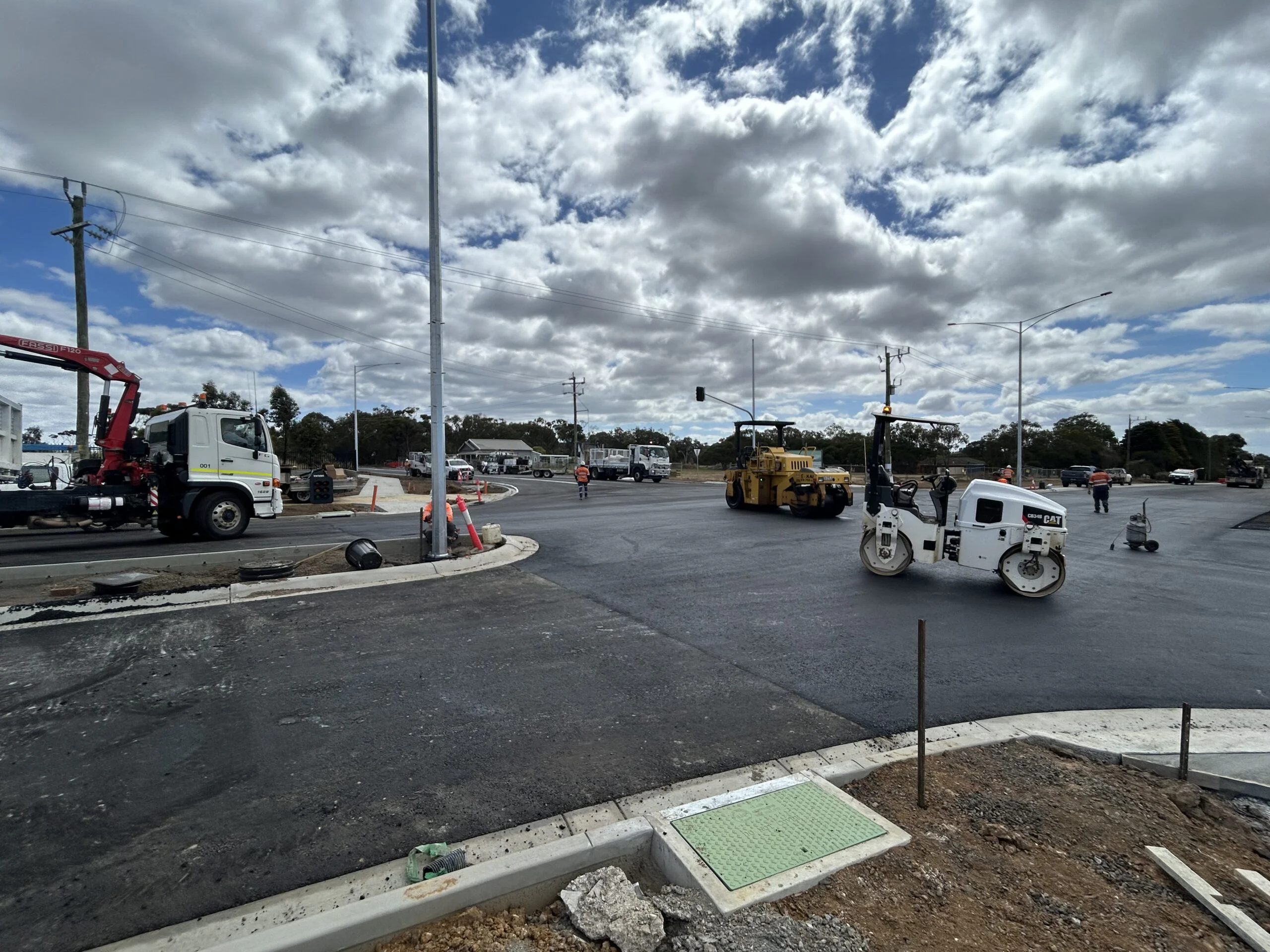 Civil construction machinery sealing a road in Victoria, Australia