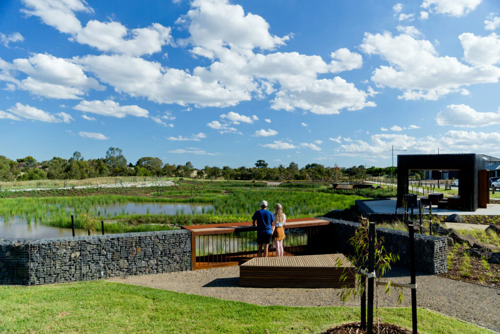 Couple looking out over wetlands in Melbourne Australia