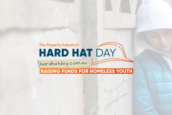 Hard Hat Day logo with child in the background.